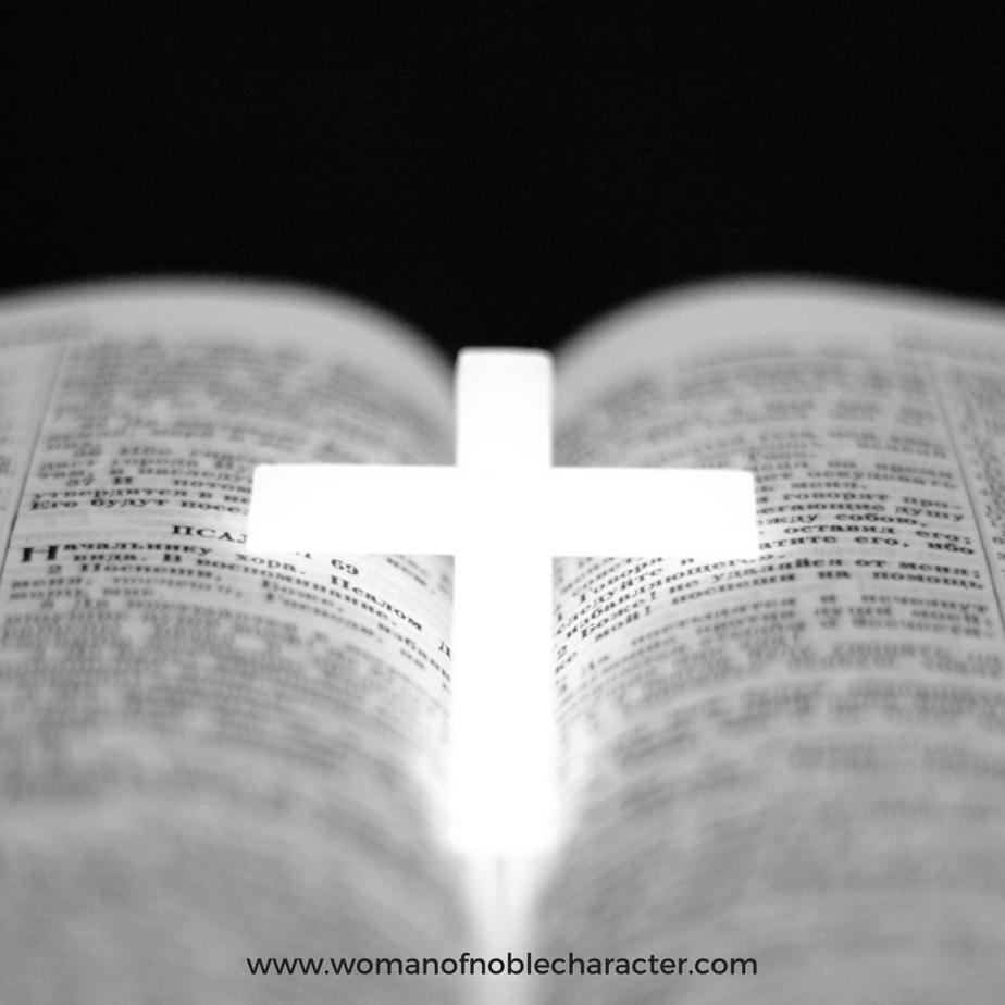 image of open Bible with cross-shaped light above for the post Relationship Not Religion: My Testimony of Faith in Christ