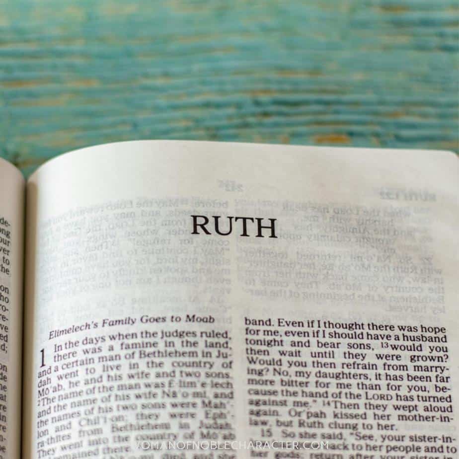 image of the bible opened to the book of ruth links to post the story of ruth and Naomi