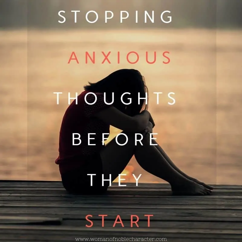 image of a woman sitting with her head down for the post Stopping anxious thoughts before they start