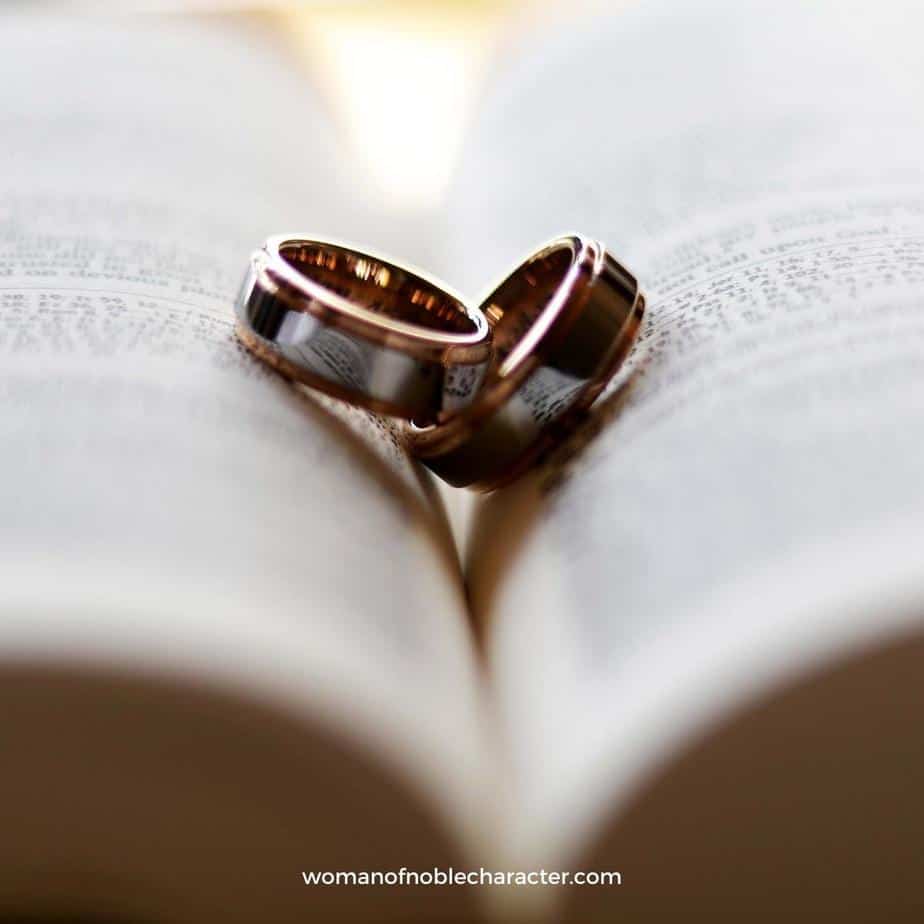image of wedding rings on open Bible for the post How to Have a Thriving Christian Marriage: Marriage Advice from 14 Experts