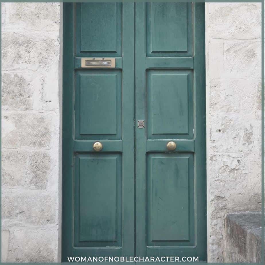 image of closed green door on stone wall for the post The Symbolism of Closed Doors in the Bible: What God May be Telling You
