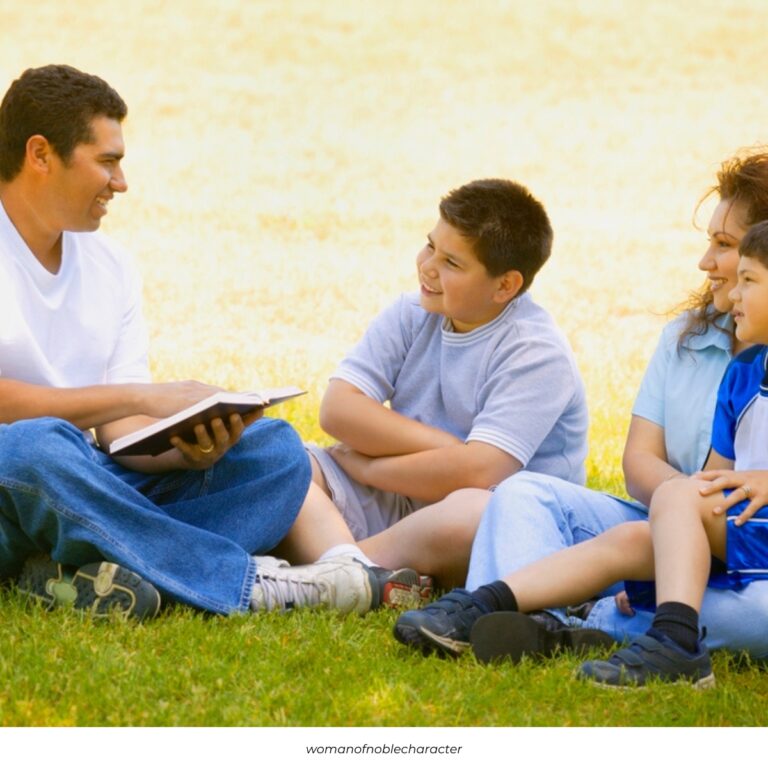 image of dad leading family devotions with wife and two sons