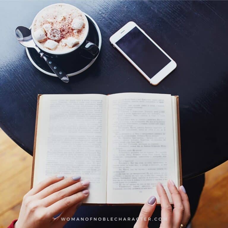 image of women with open Bible, latte and phone for the post 12 Best Bibles For Women to Grow in God's Word