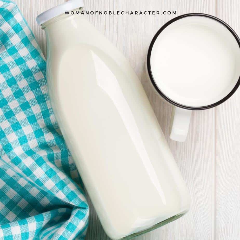 image of bottle of milk with cup of milk and turquoise checked cloth on white background for the post Milk in the Bible - Food and Symbolism in Scripture