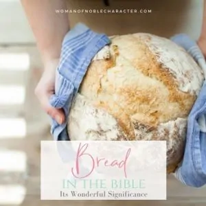 image of woman holding fresh baked bread with text overlay of symbolism of bread in the Bible;Bread in the Bible