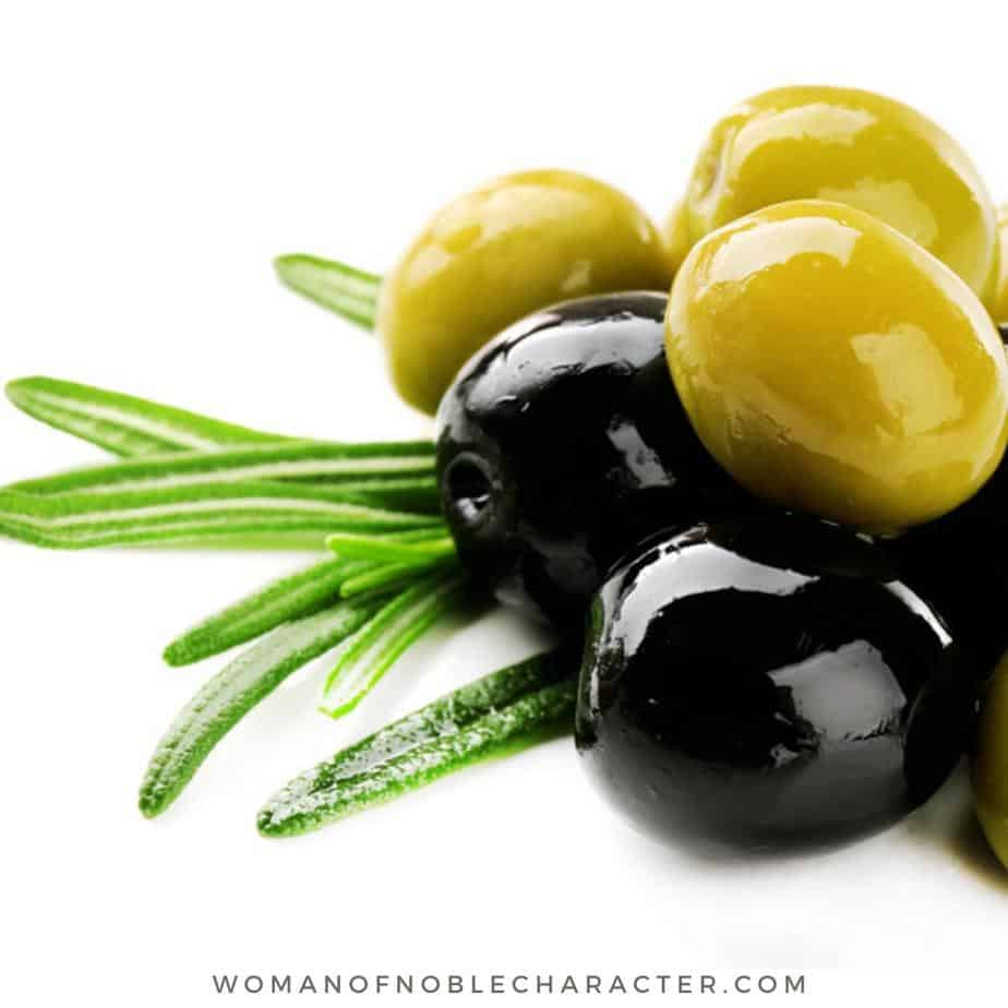 image of green and black olives for the post A Fascinating Study of Olives in the Bible (plus Olive Trees, Olive Oil and Olive Branches)