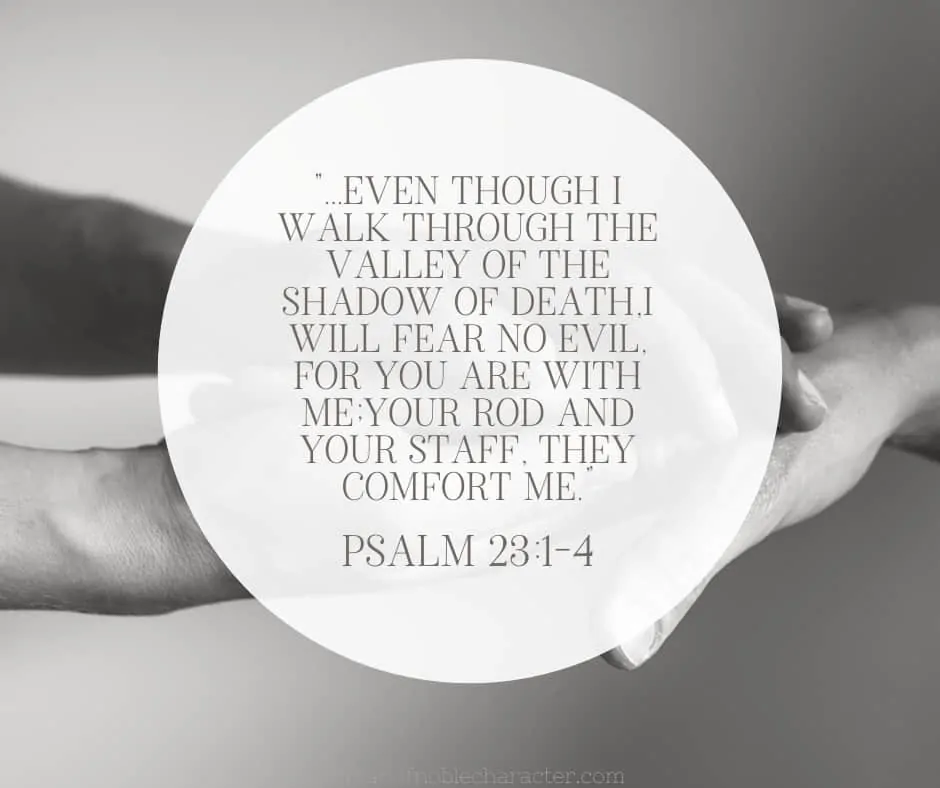 A black and white image of 2 hands holding with the quote, ""...Even though I walk through the valley of the shadow of death,I will fear no evil, for You are with me;Your rod and Your staff, they comfort me.” from Psalm 23:1-4