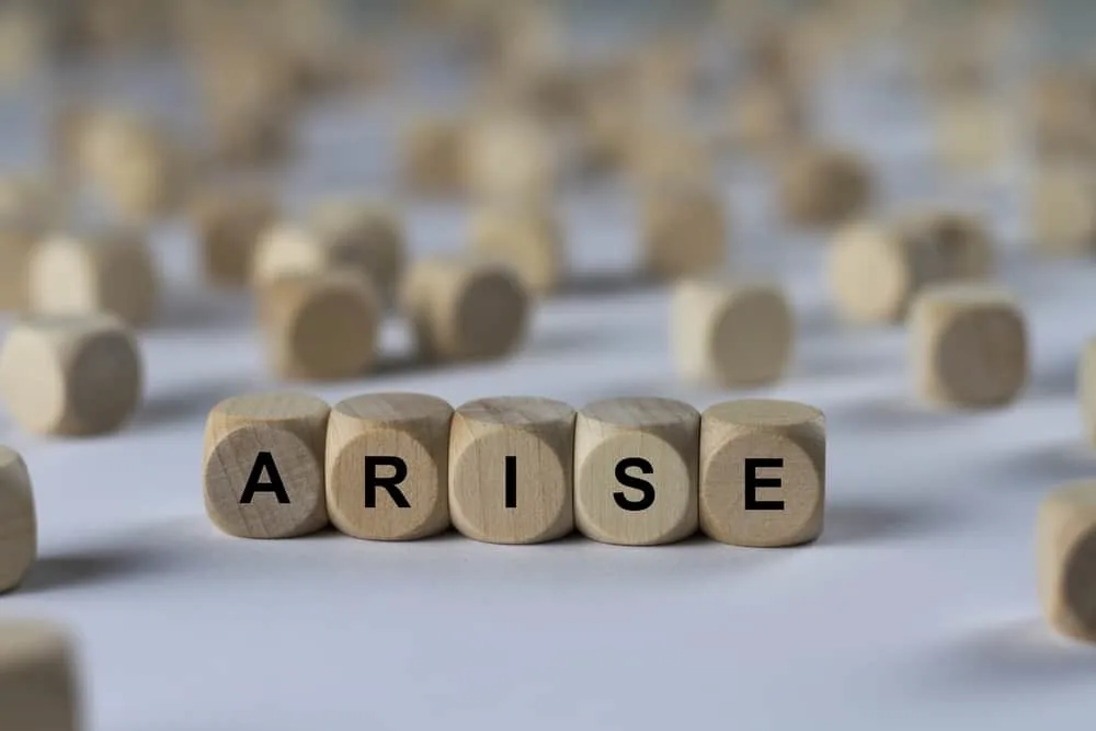 arise   cube with letters, sign with wooden cubes; arise and go