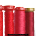 image of four rolls of scarlet thread for the post How to Clothe Your Family in Scarlet: Deeper Look at Proverbs 31:21