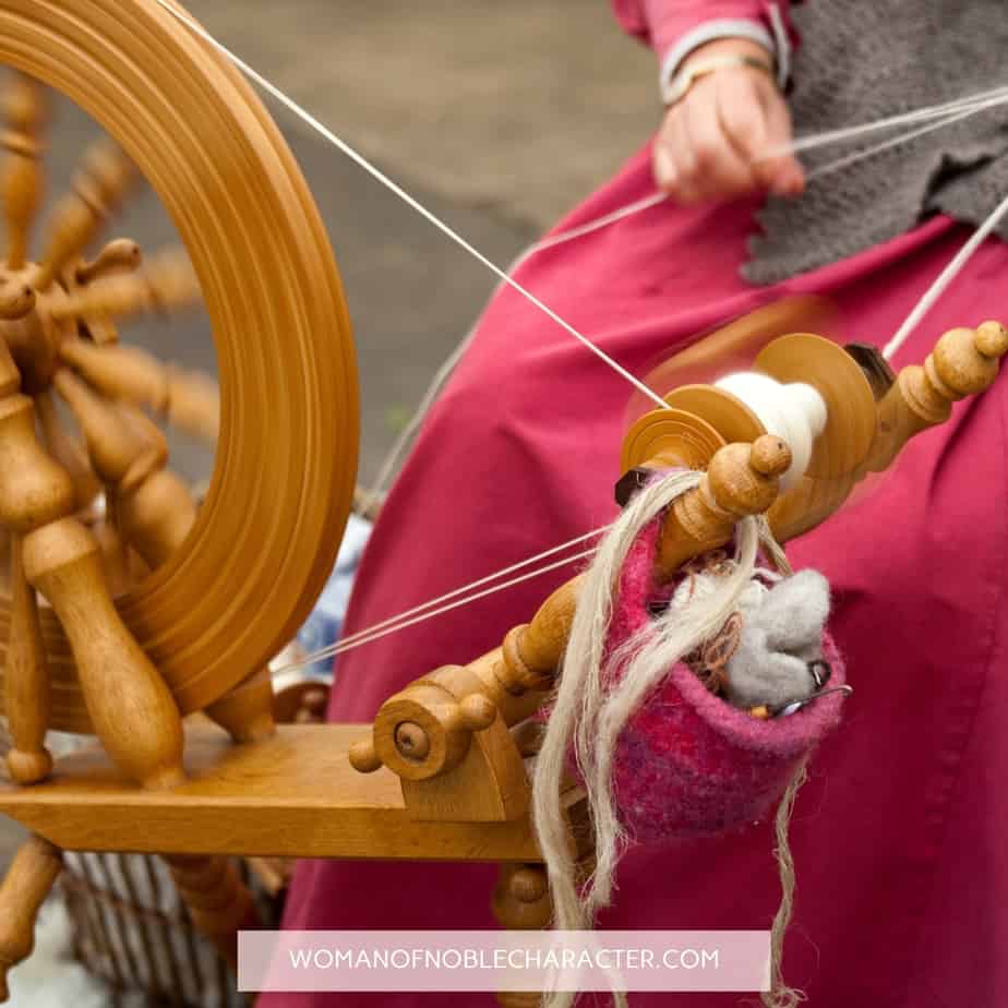 image of woman spinning yarn for the post Holding the Distaff? What Proverbs 31:19 Really Means in Modern Society