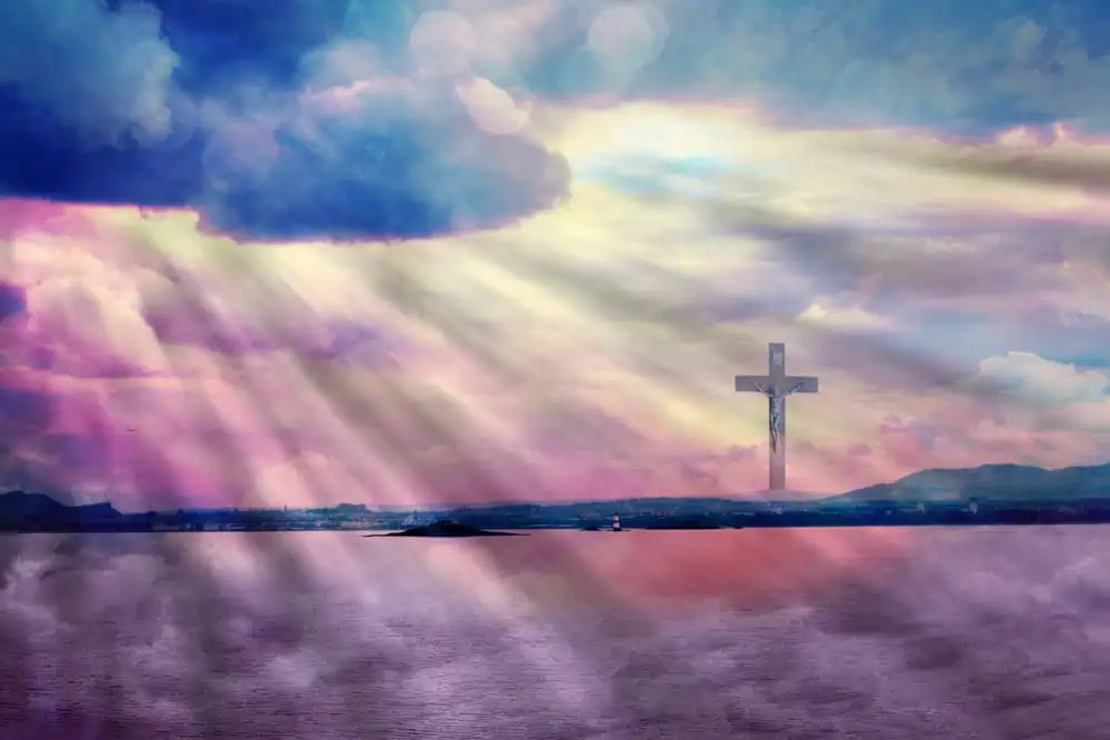 image of The Cross of Jesus Christ and beautiful clouds for the post on reflection of Christ