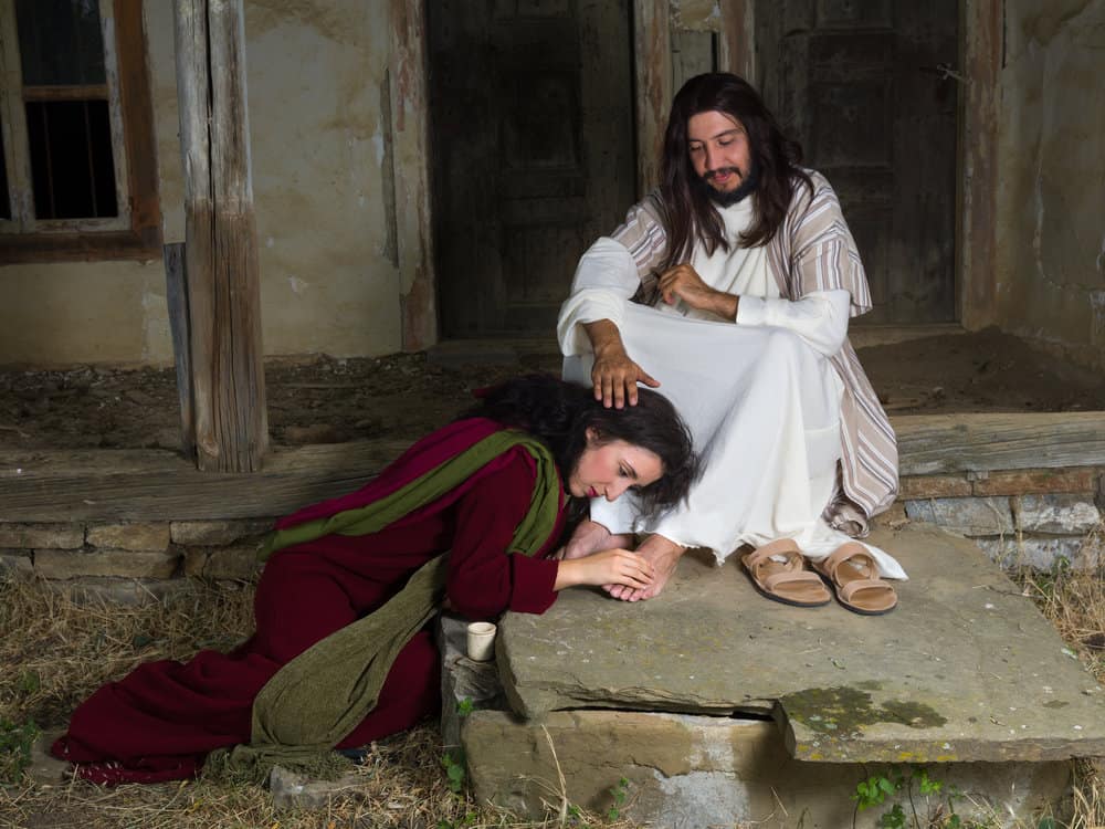 image of Mary crying of shame and embalming Jesus' feet for the post on Mary of Bethany
