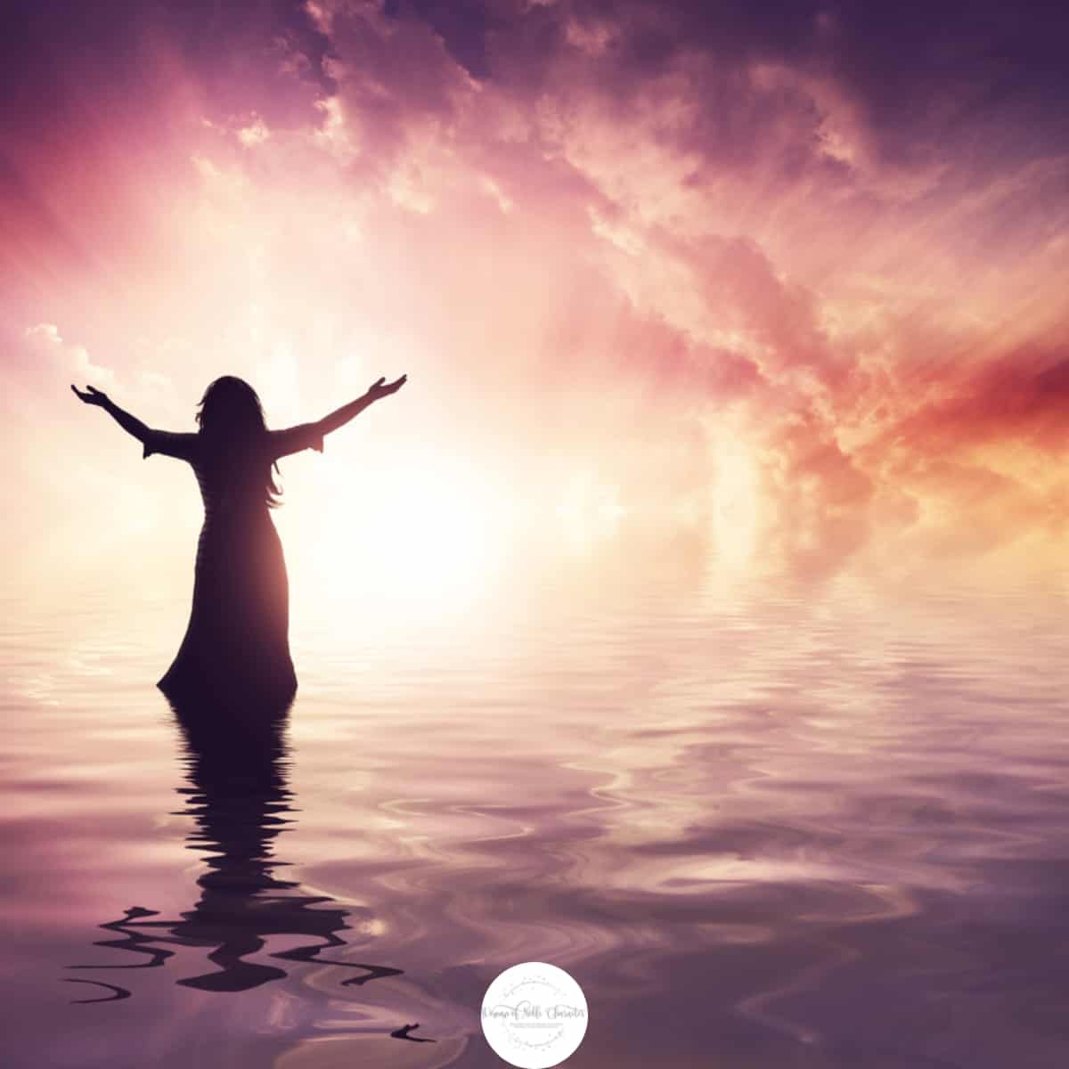 image of woman raising her arms upward at sunset for the post Obey God rather than man: what it means and how to live it out daily