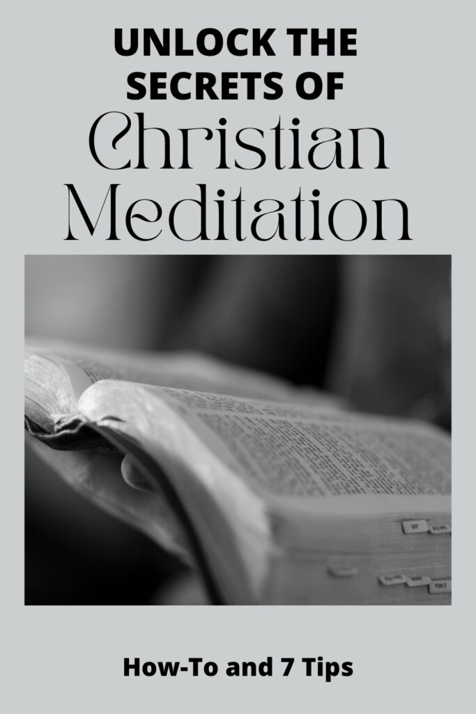 black and white photo of hand holding Bible for the post on Christian meditation