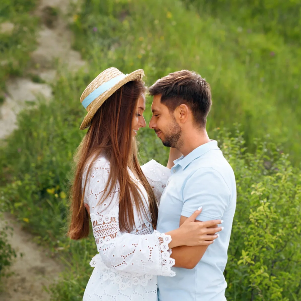 happy couple in field for the post marriage preparation 5 crucial steps to take before getting engaged
