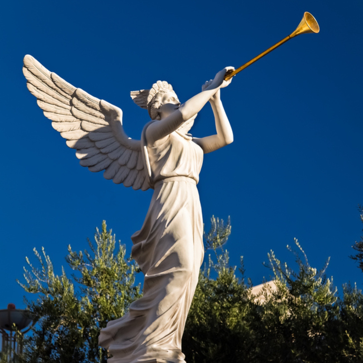 image of statue of angel blowing trumpet for the post on the seven trumpets in the Bible