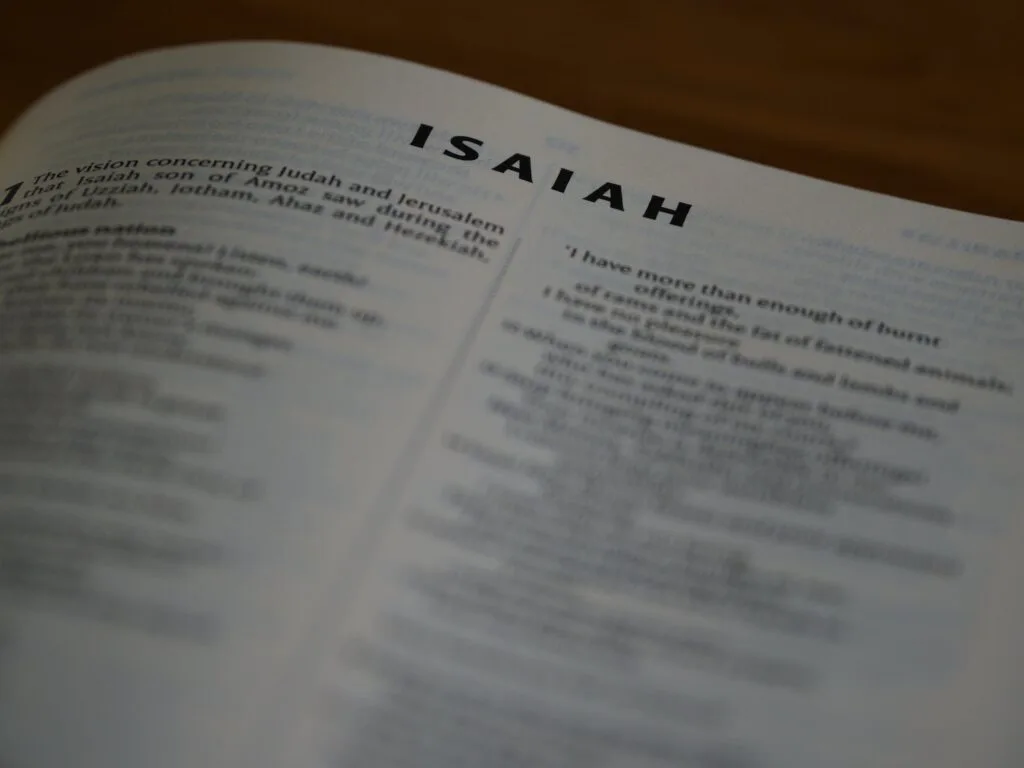 image of Bible opened to book of Isaiah for the post Exploring Symbolism and Spiritual Meaning in the Book of Isaiah