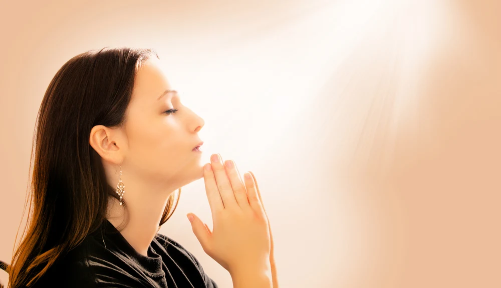 image of praying woman for post prayer for your husband